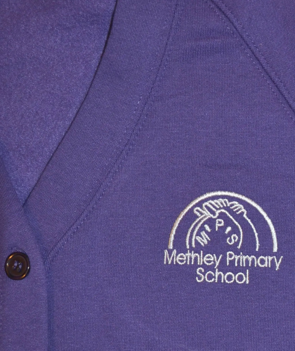  A purple Methley Primary School cardigan with a button-up front, ribbed cuffs, and hem, displayed on a white background, showcasing its soft and durable fabric.